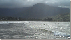 Surfers in Hanalei Bay