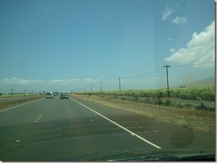 Driving to Kihei - a red dust cloud to the right