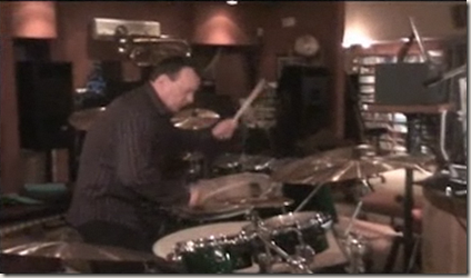 Neil Peart playing the drums at Stewart Copeland's studio