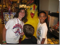 Posing with a chicken